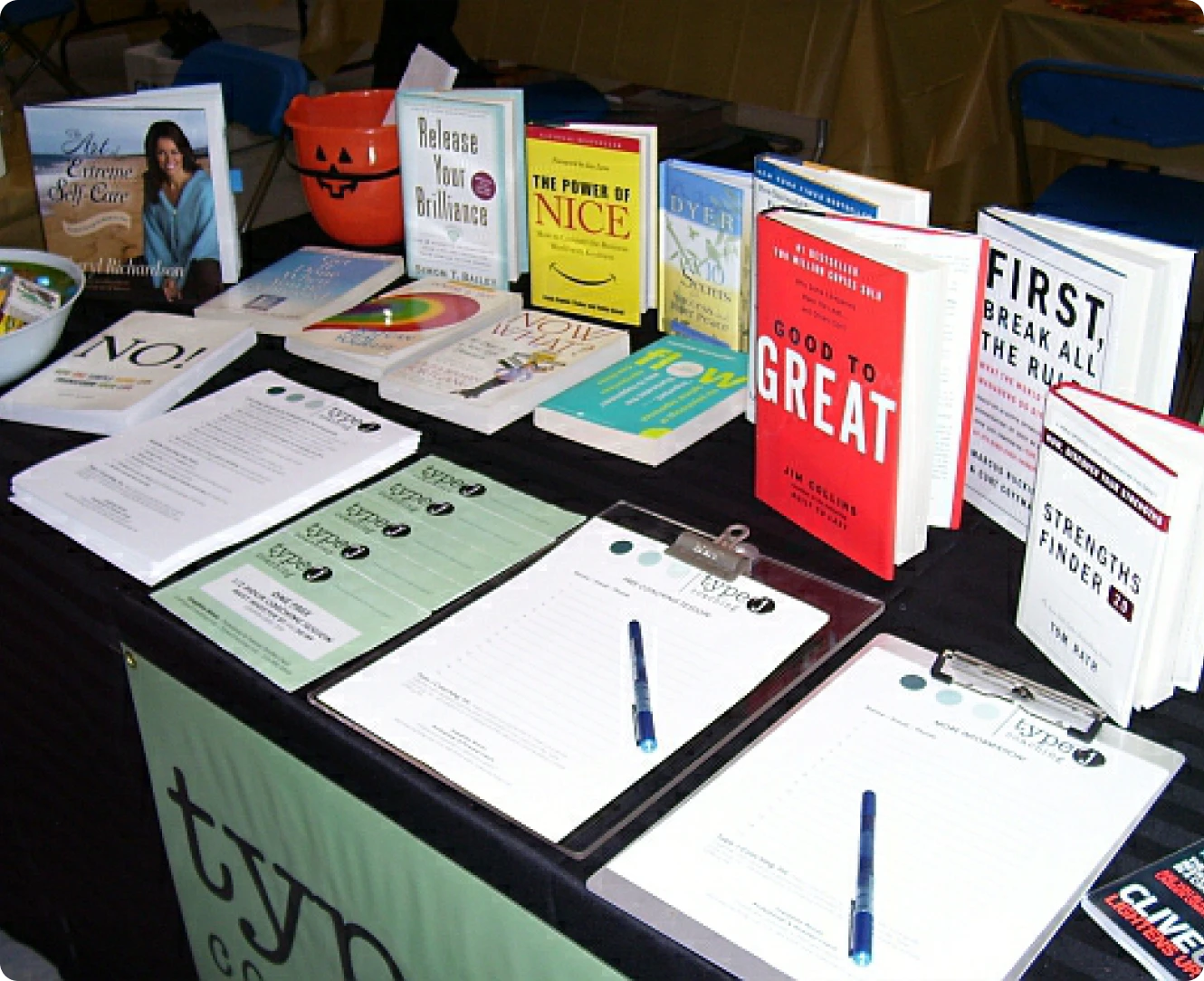 Books and pens on a display table